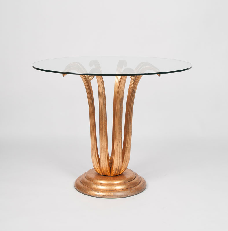 A Vintage table with gilt flower-shaped foot