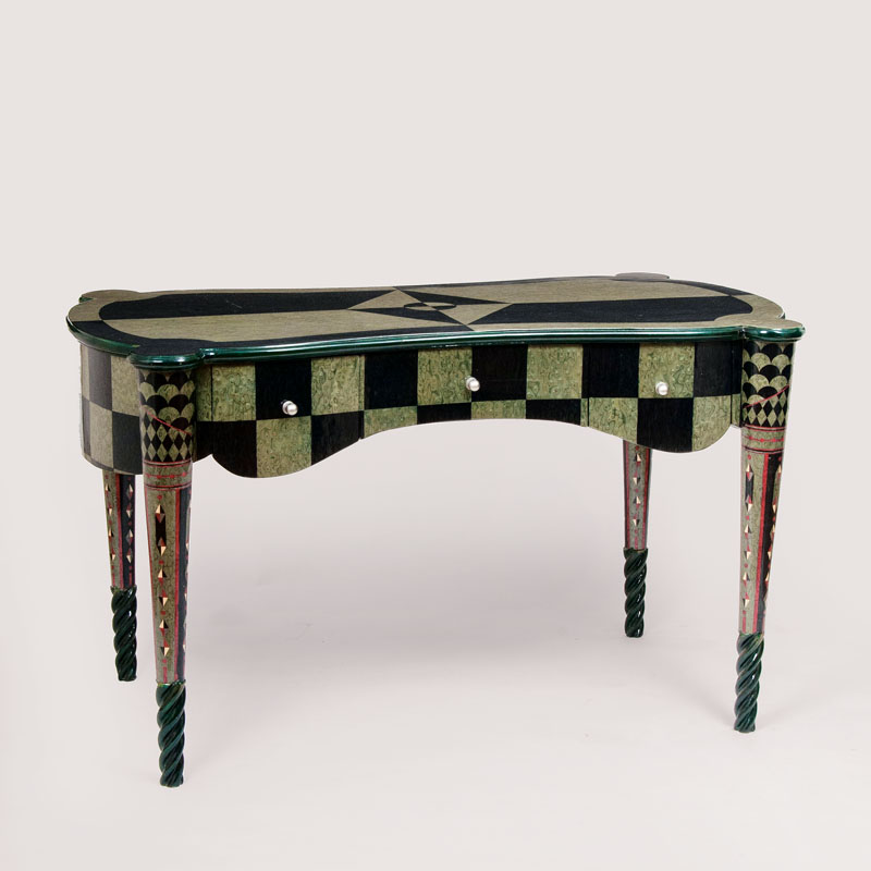 A Mid Century writing desk with 'Trompe-l'oeuil' laquer painting