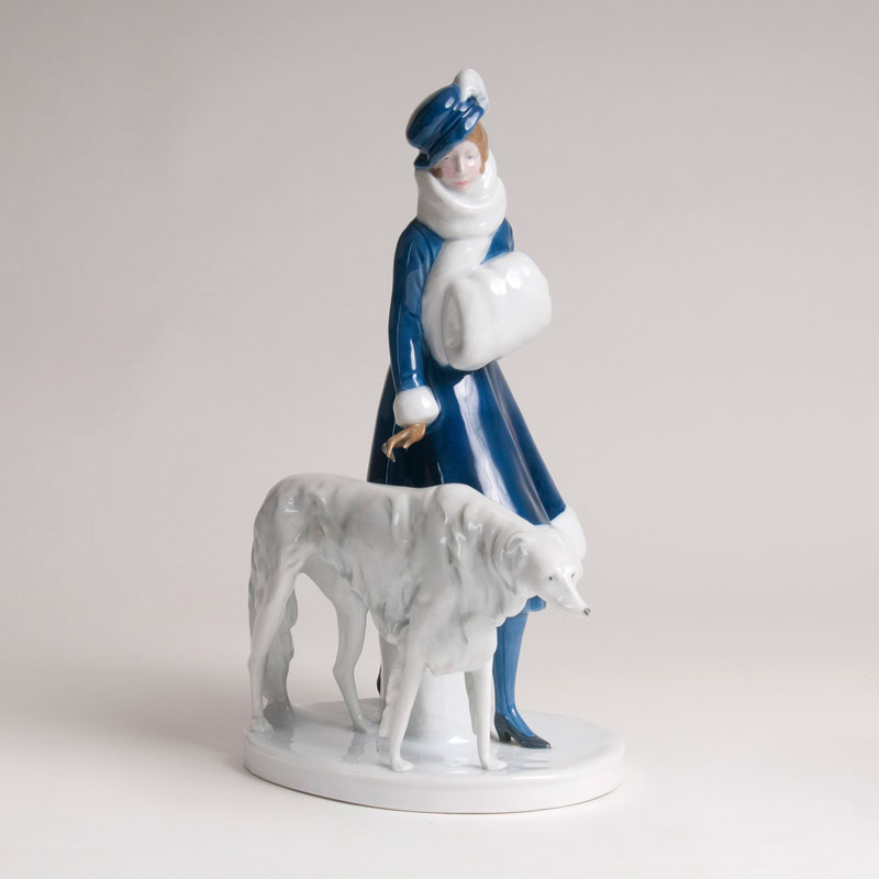 An Art Nouveau porcelain group 'Lady with a Greyhound'