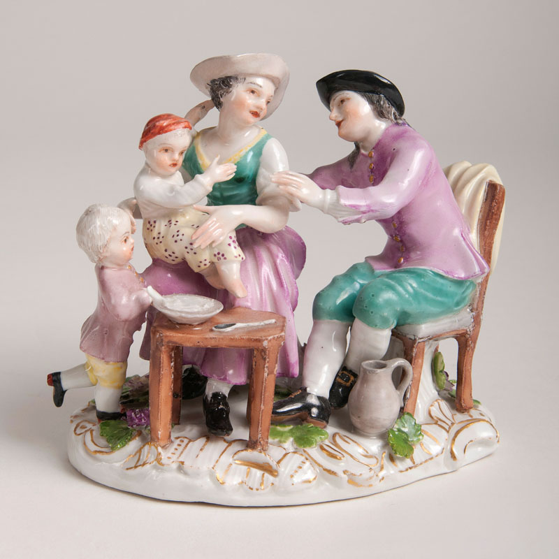 A small porcelain group with a Dutch family