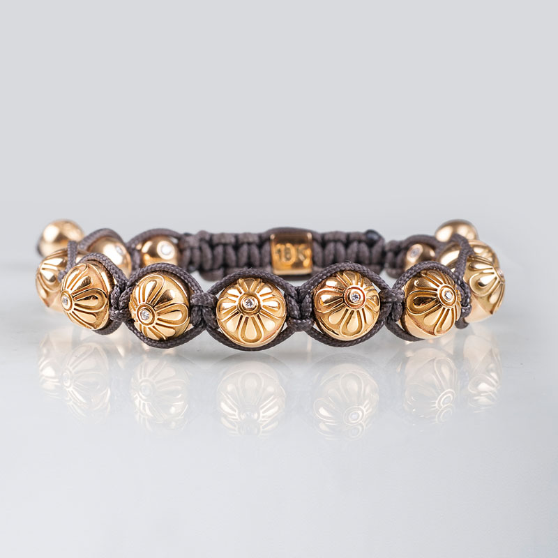 A gold diamond braided bracelet by Shamballa Jewels