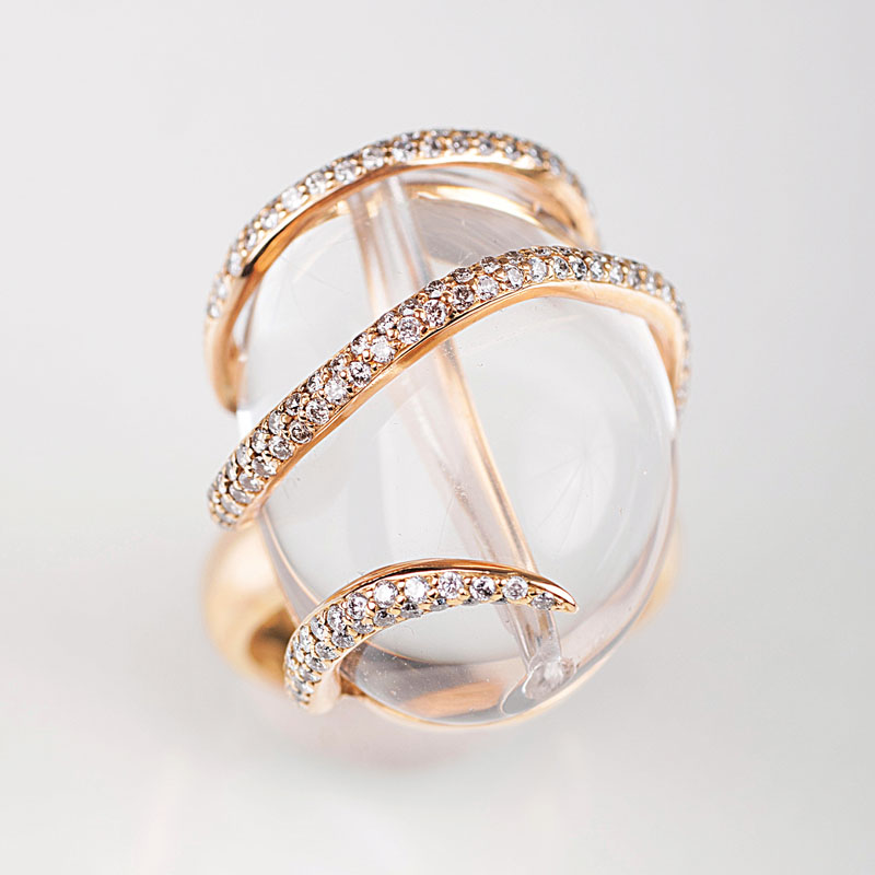 A modern rock crystal ring with diamonds