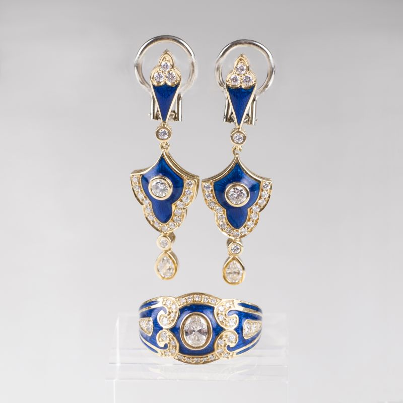 A diamond enamel jewellery set with ring and earclips