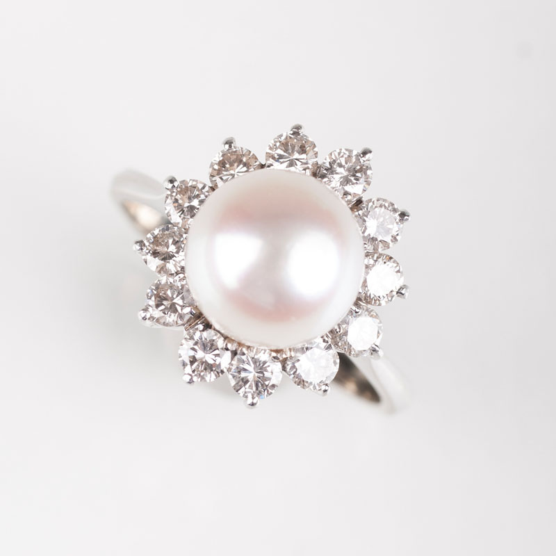 A pearl diamond ring