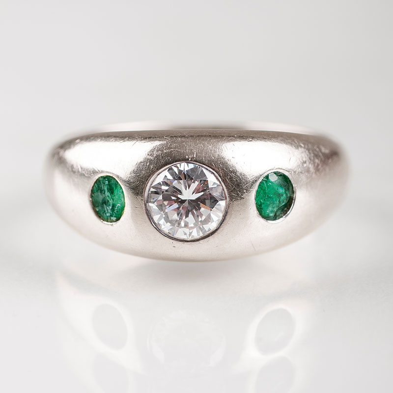 A diamond emerald ring