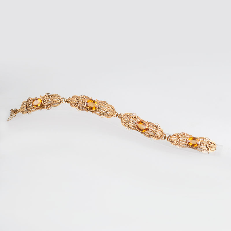 A gold bracelet with citrin