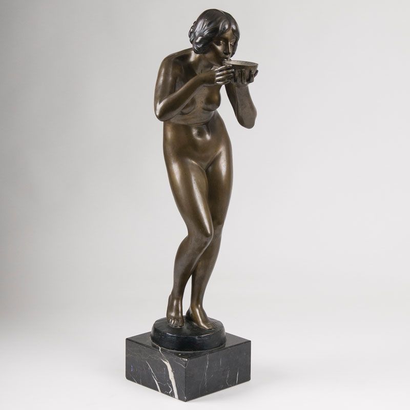 A tall bronze figure 'Drinking female nude' - image 3