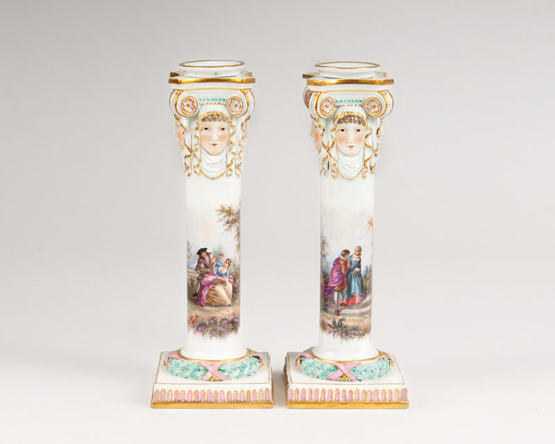 A pair of candlesticks with Watteau painting