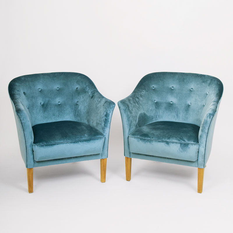 A pair of Mid Century club chairs