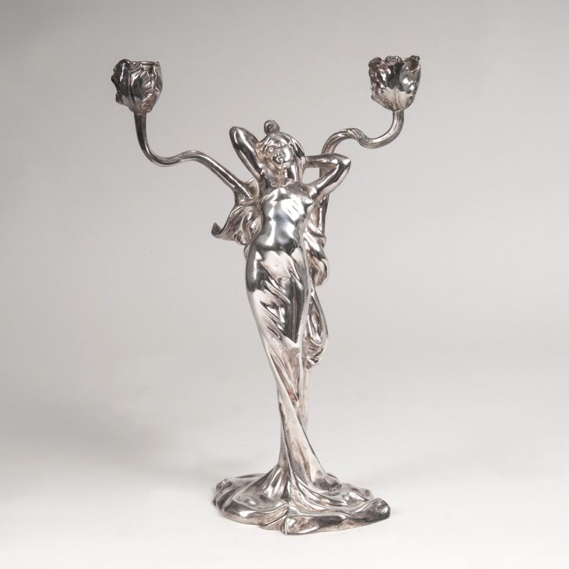 A figural candlestick 'Spring awakening' in Art Nouveau style