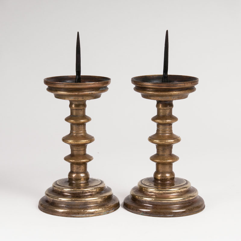 A pair of small Renaissance candlesticks