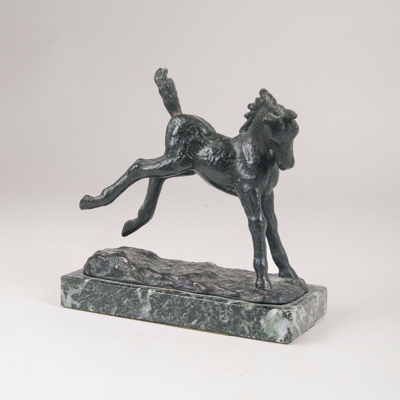 A small animal bronze 'Jumping foal'