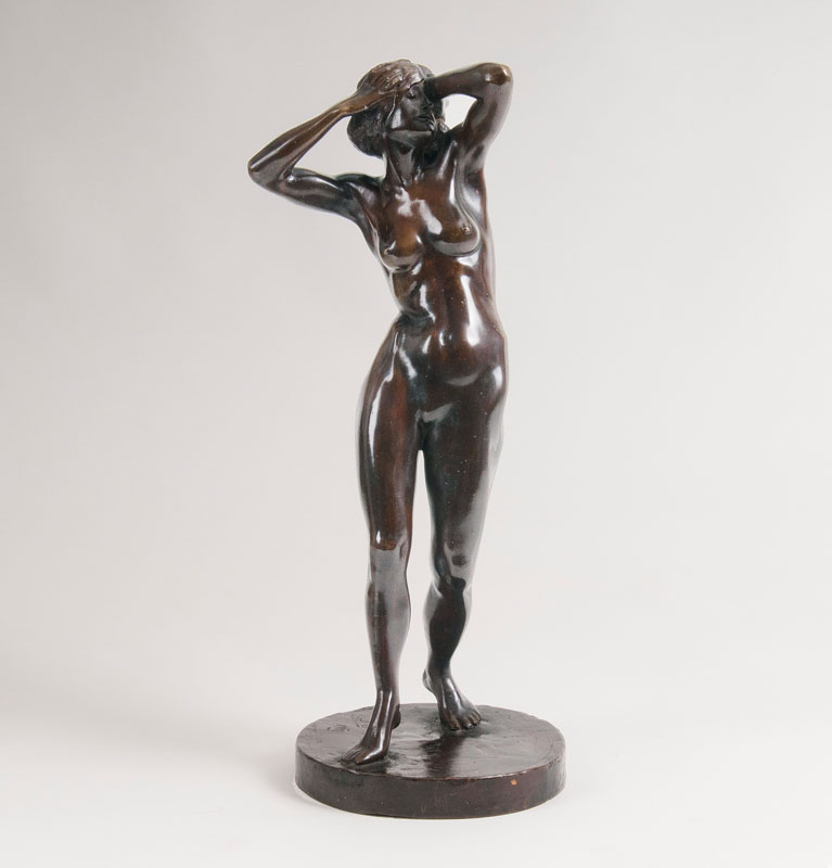 A bronze sculpture 'Dancing female nude'