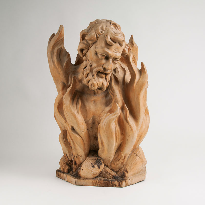 A baroque wooden sculpture 'Poor soul in purgatory'