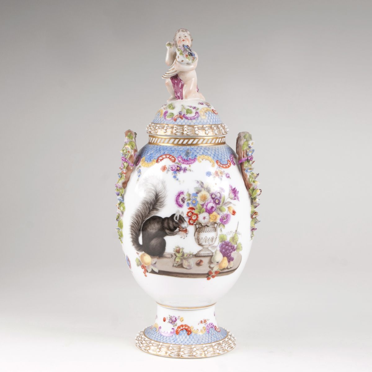 A decorative  cover vase with squirrel