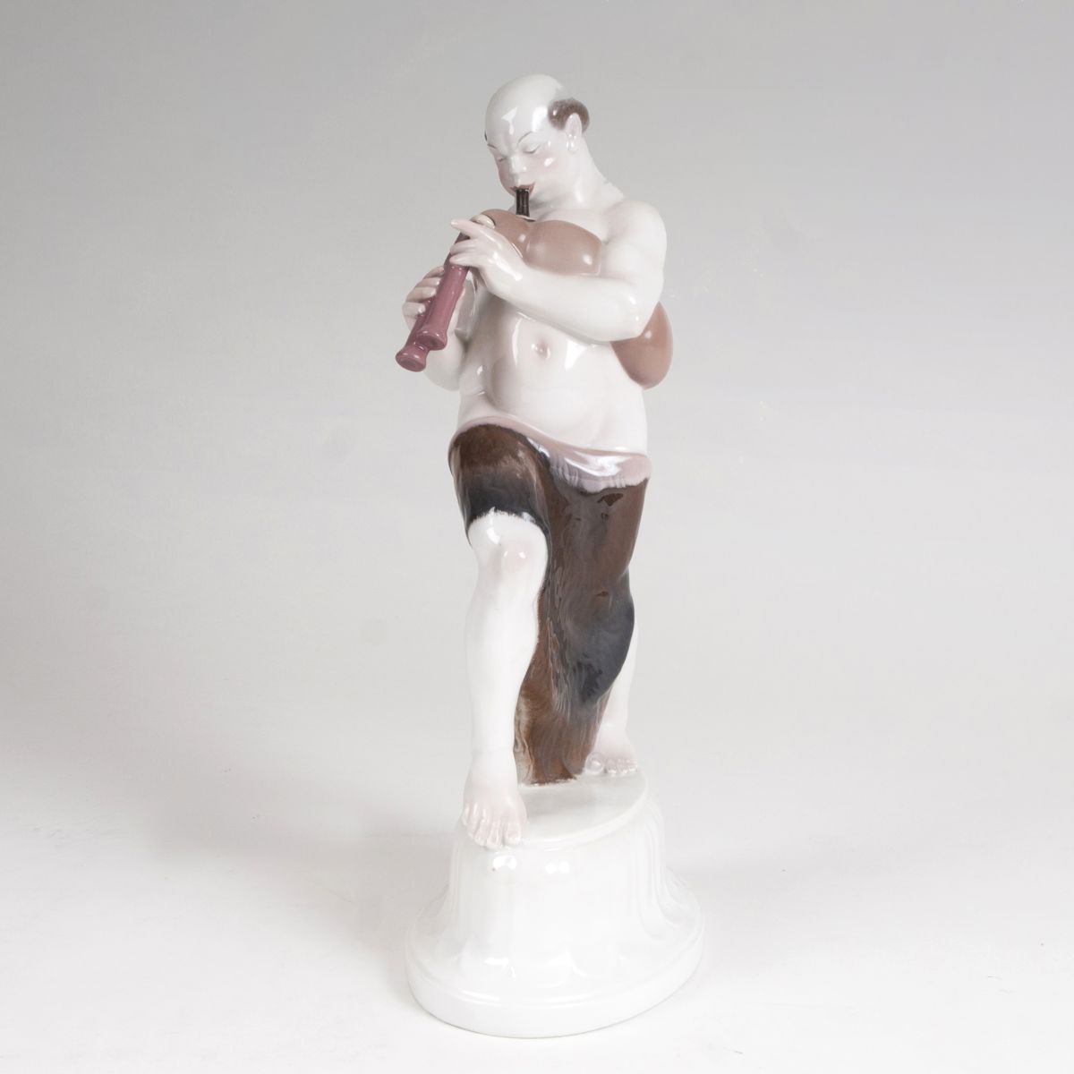 A porcelain figure 'Arab with bagpipe' from the 'Wedding Procession'