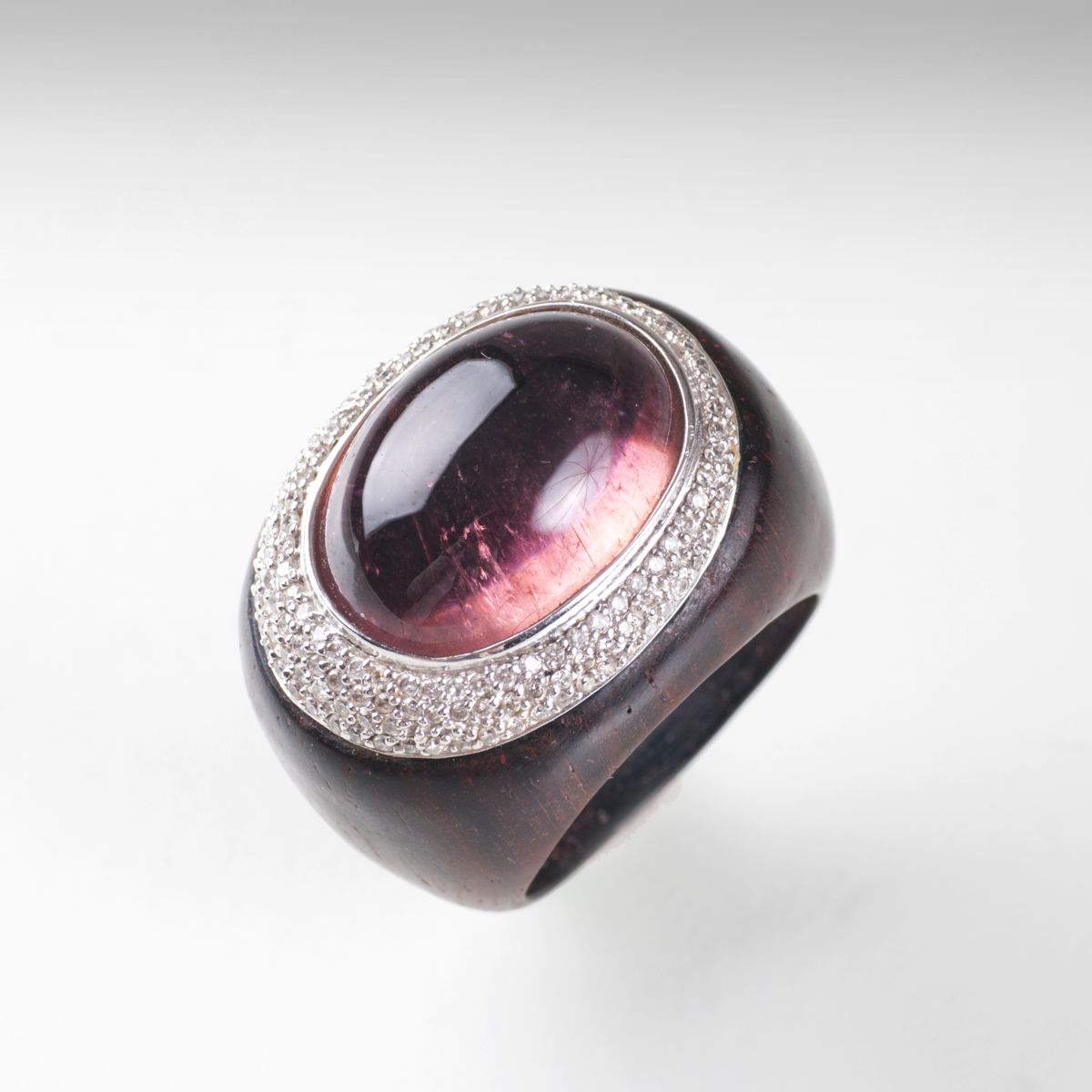 A modern precious wood kunzite diamond ring