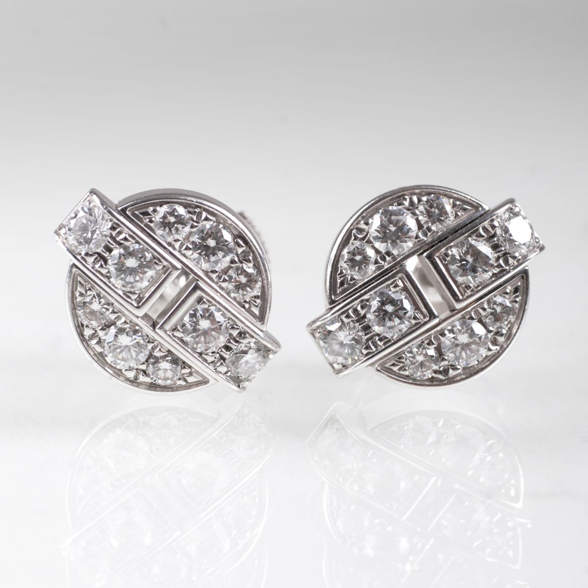 A pair of diamond earstuds by Cartier