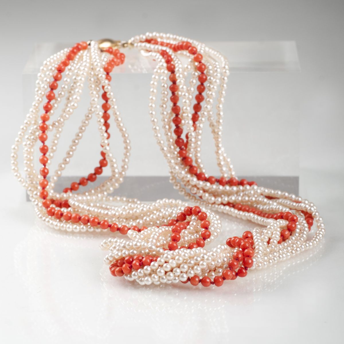 A seedpearl necklace with coral