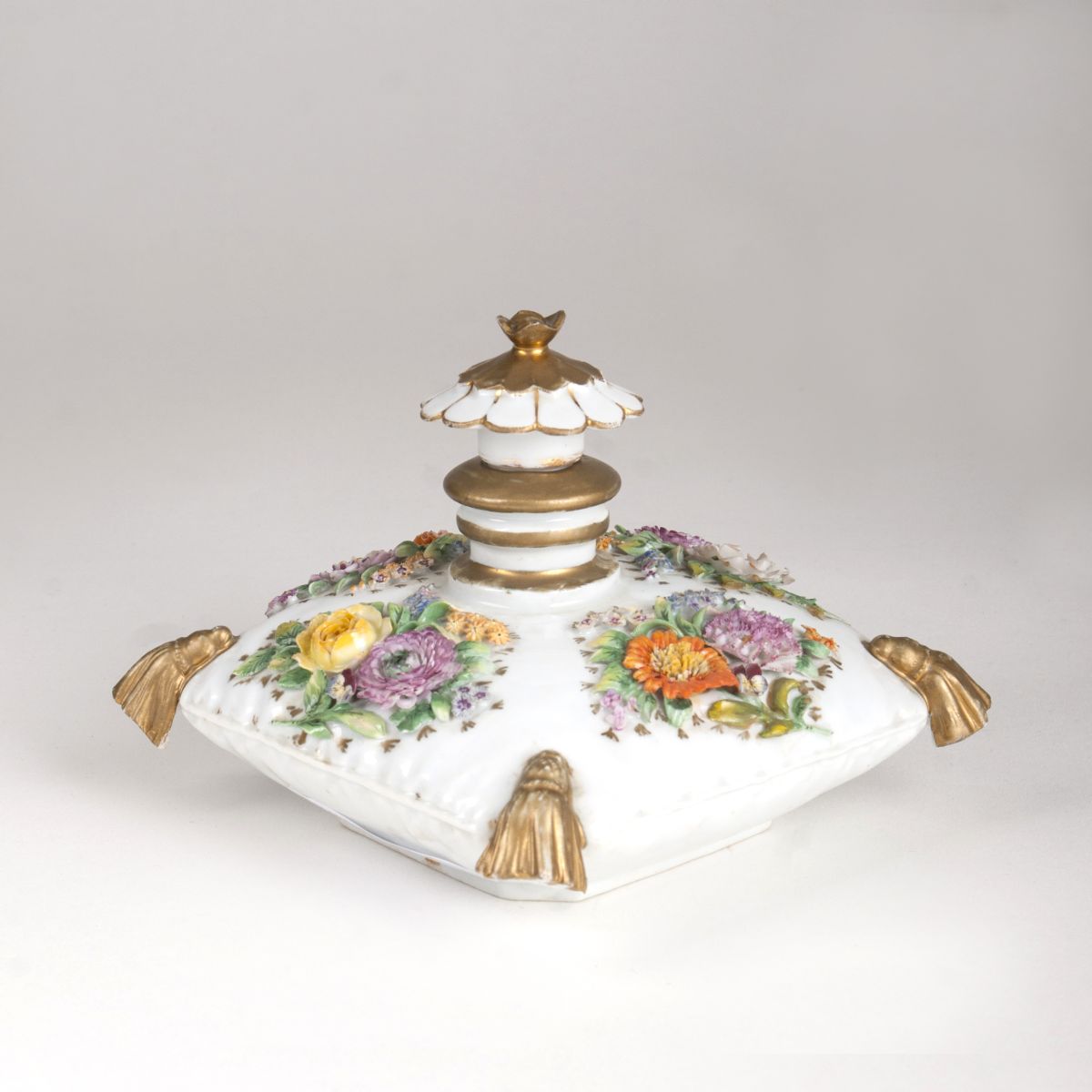 A very decorative porcelain flacon in cushion-shape