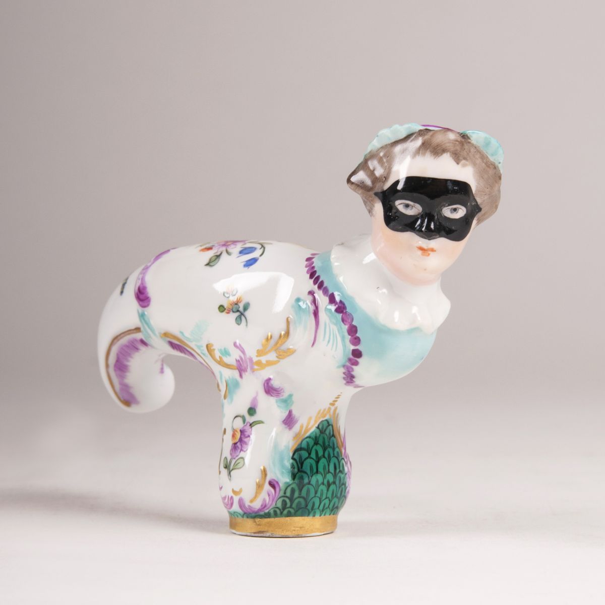 A Meissen cane handle with Commedia dell'Arte-bust