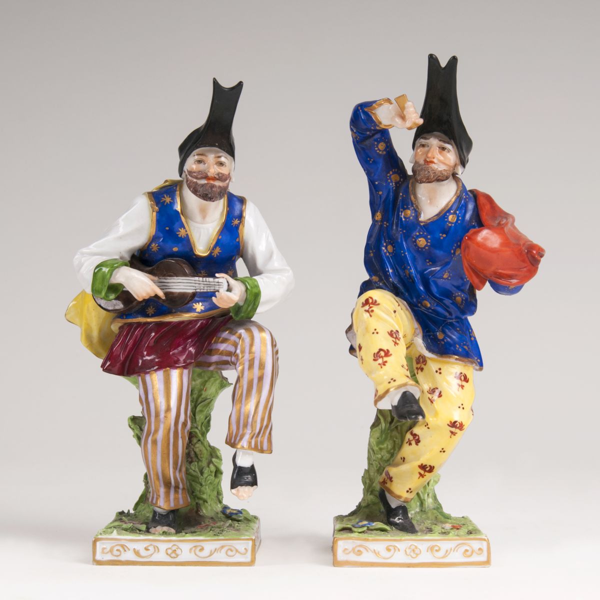 A Pair of Porcelain Figures 'Dancing Fools'