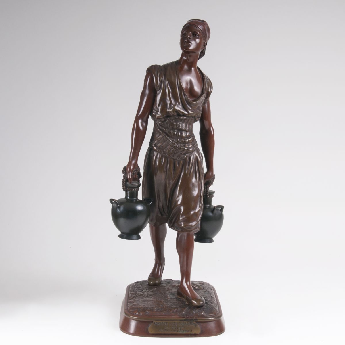 A bronze sculpture 'Tunisian water carrier'