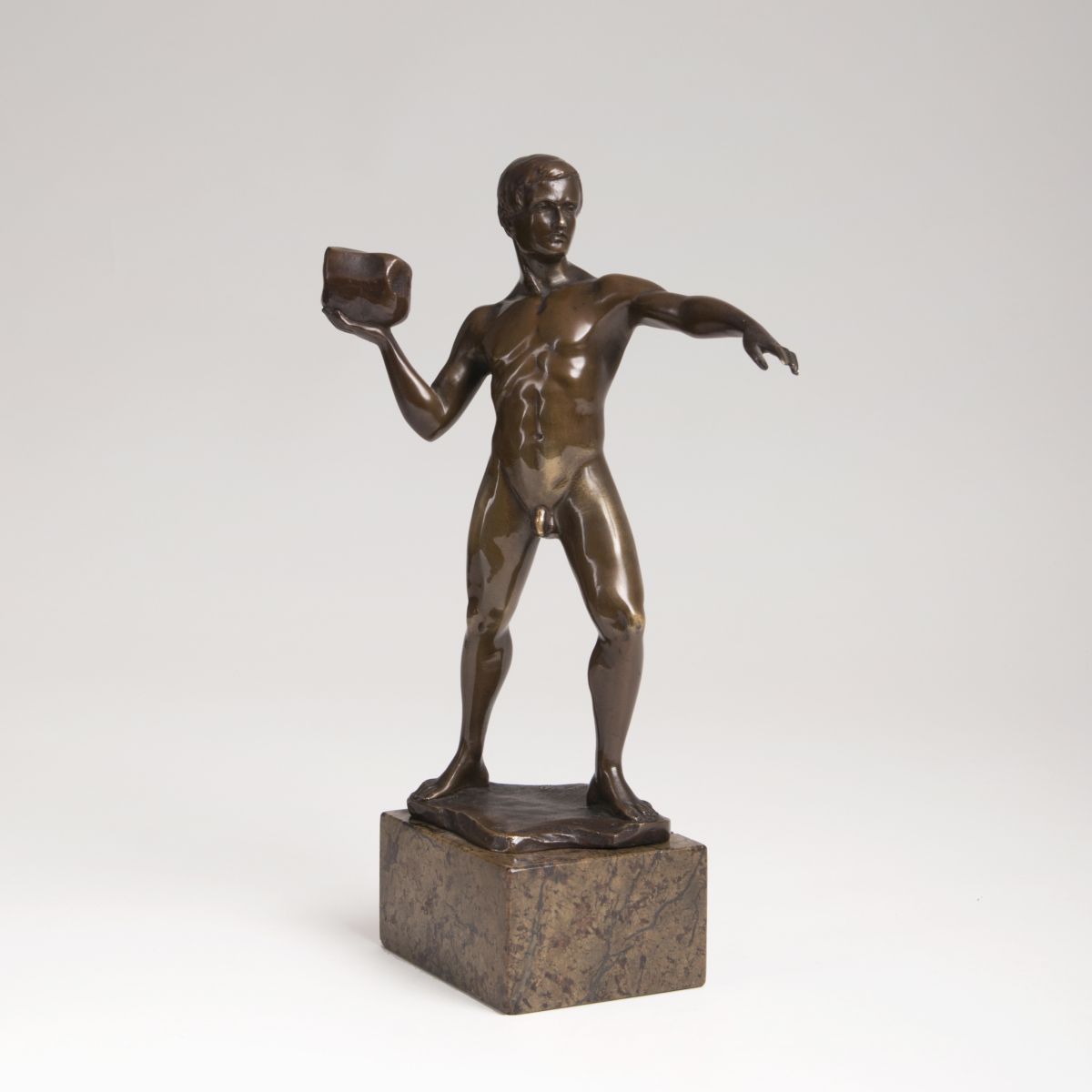 A bronze sculpture 'Thrower of stone'