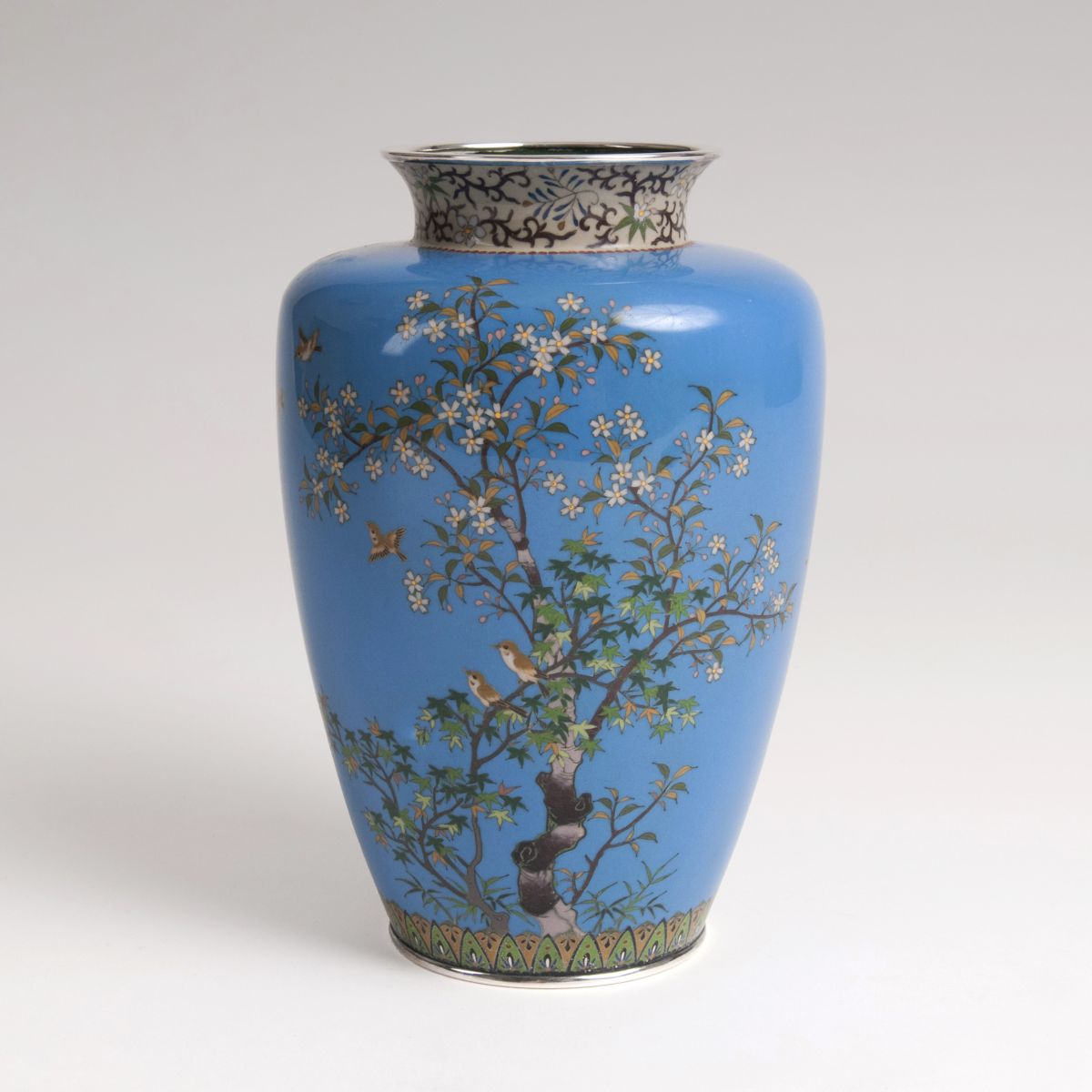 A Cloisonné vase with flowers and birds
