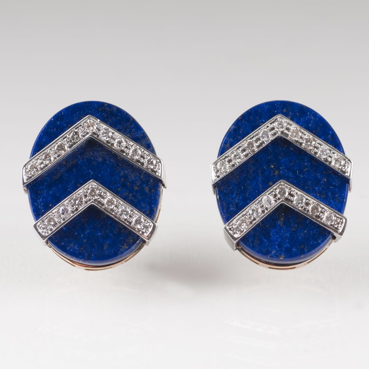 A pair of lapis lazuli diamond earrings