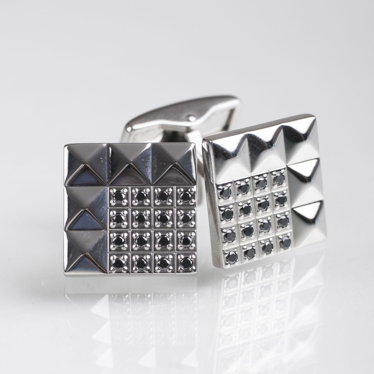 A pair of cufflinks with black diamonds by Dupont