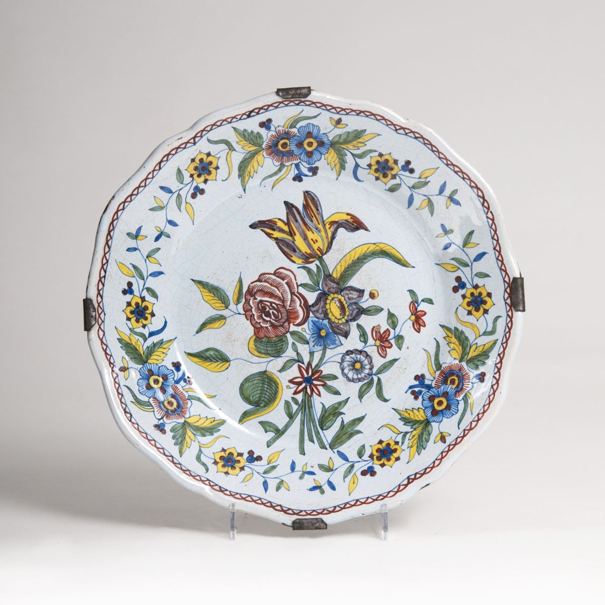 A faience plate with flower painting