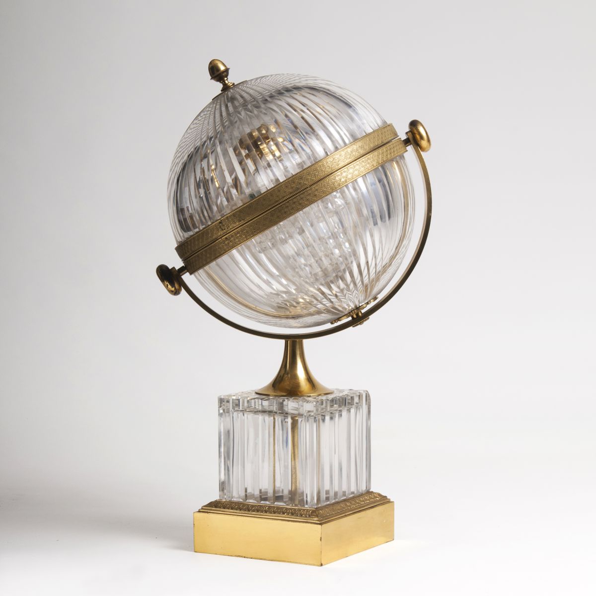 A magnificent Crystal Tantalus in shape of a globe