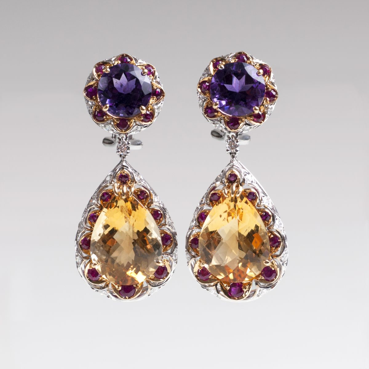 A pair of amethyst citrine earpendants with rubies and diamonds