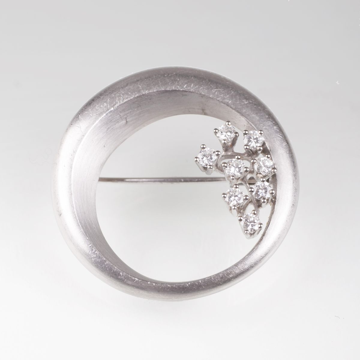 A modern brooch with diamonds