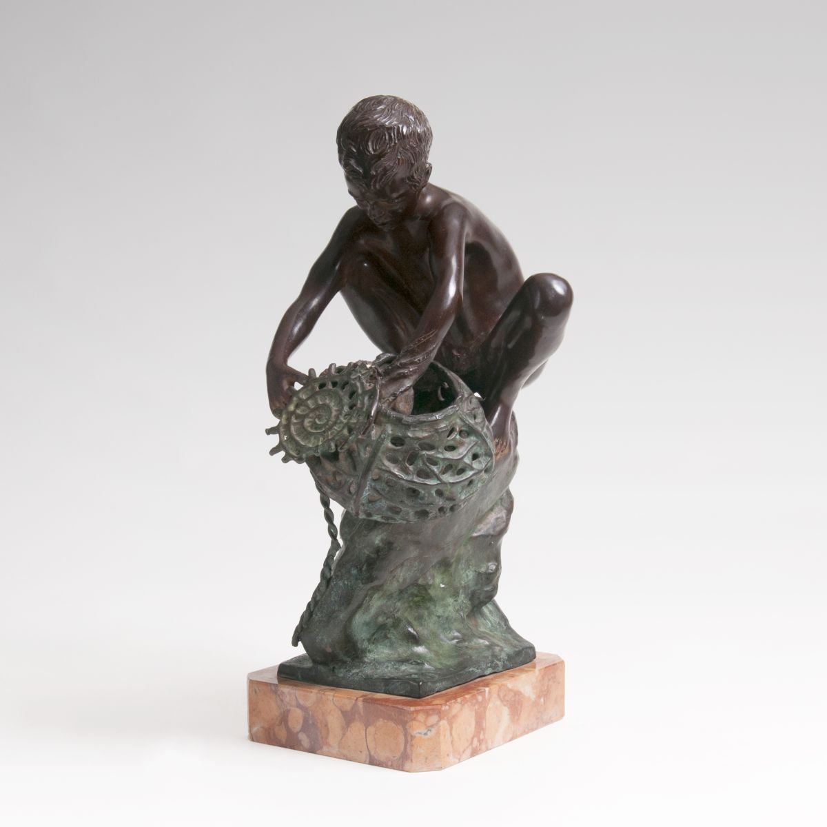 A Bronze Sculpture 'Boy with Oyster Basket'