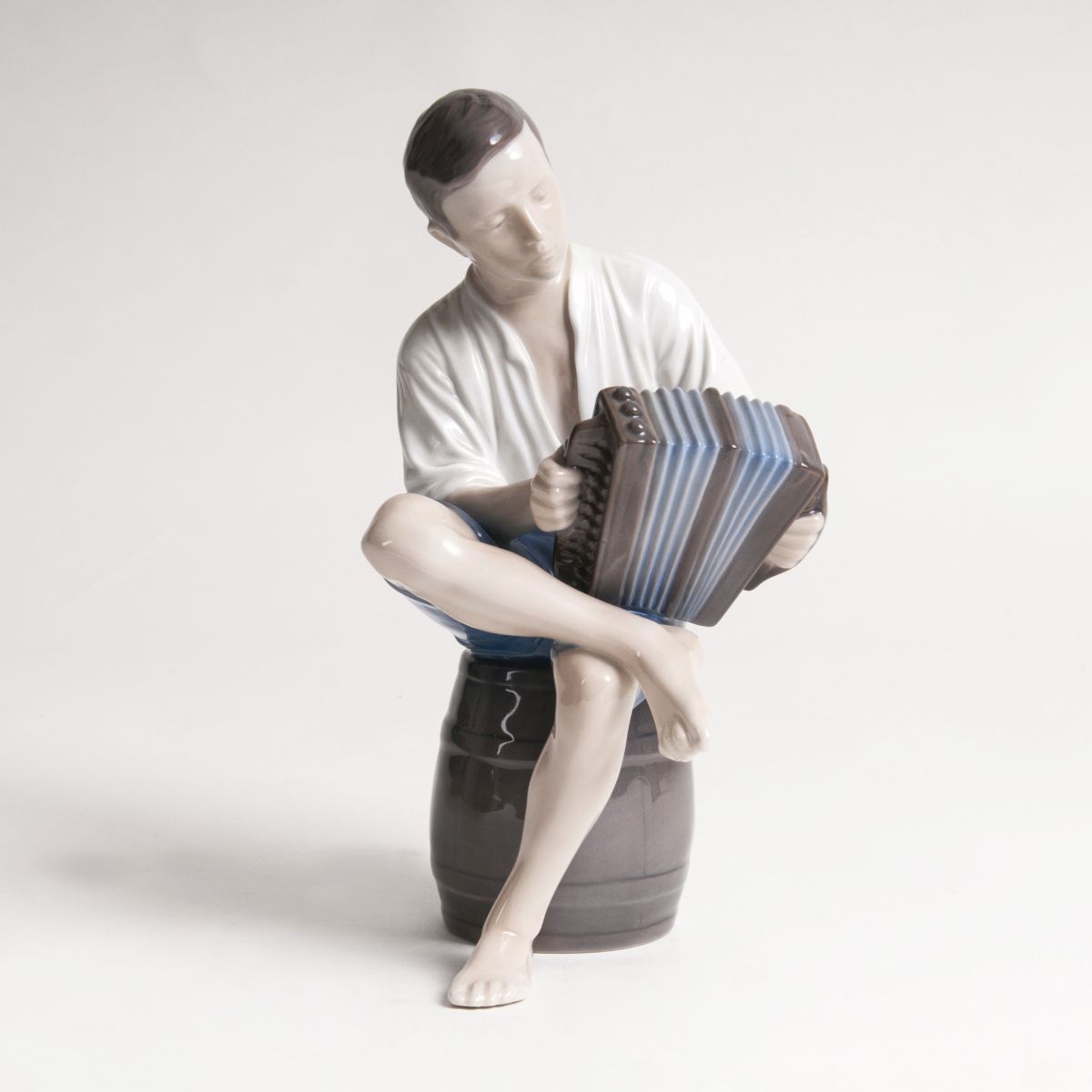 A Porcelain Figure 'Fisherboy with Accordion'