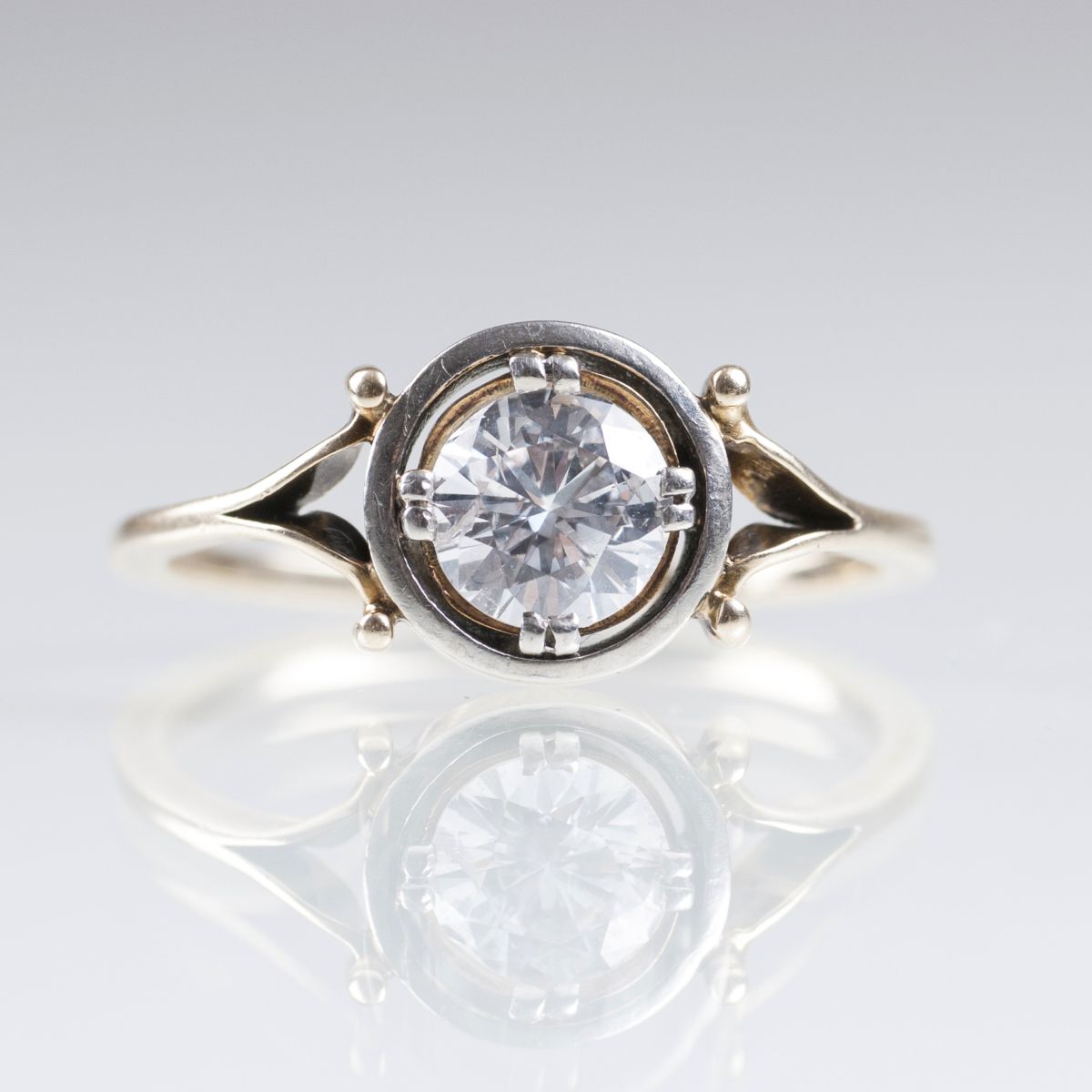 A solitaire ring with old cut diamond