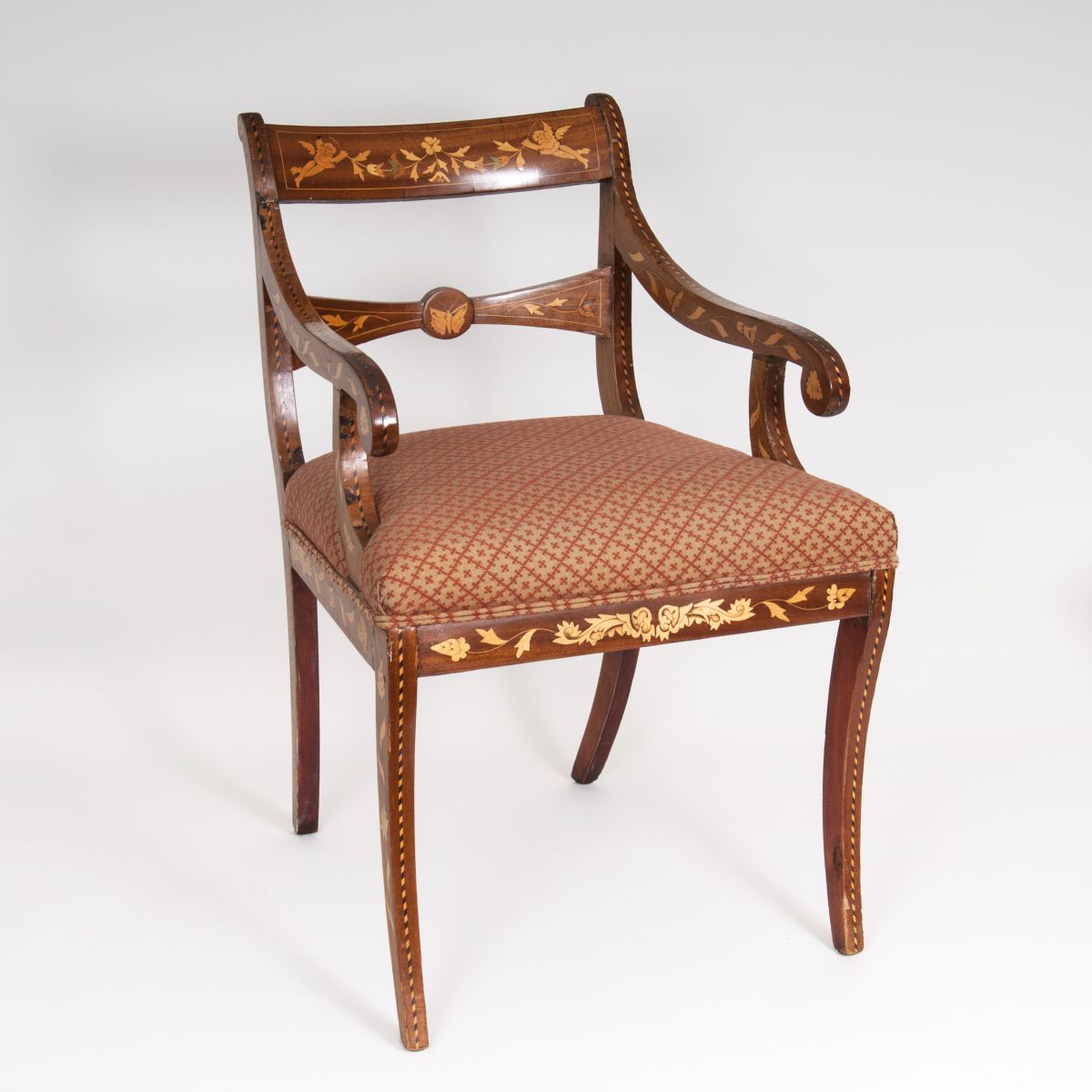 A Biedermeier Armchair with fine marquetry decor