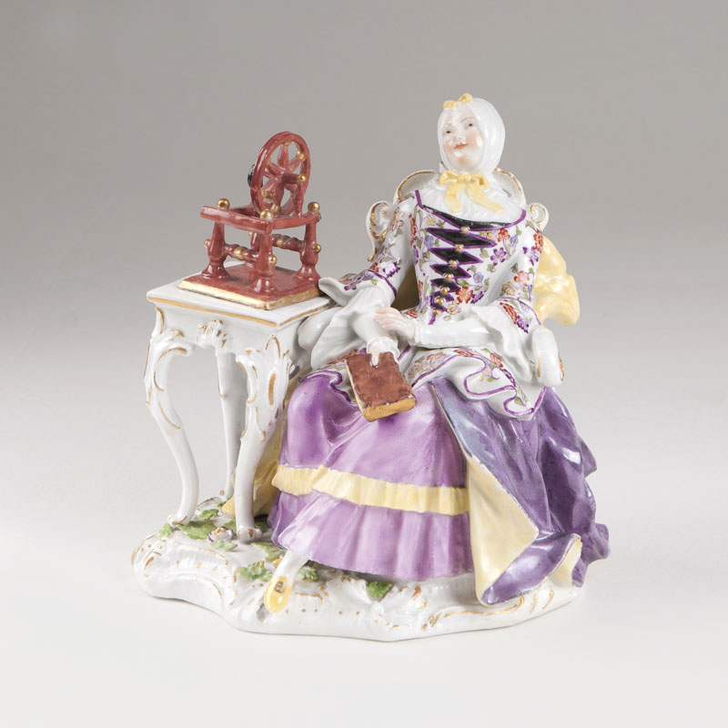 Johann Joachim Kaendler - A rare porcelain figure 'Housewife sitting by a spinning wheel' A rare porcelain figure 'Housewife sitting by a spinning wheel'