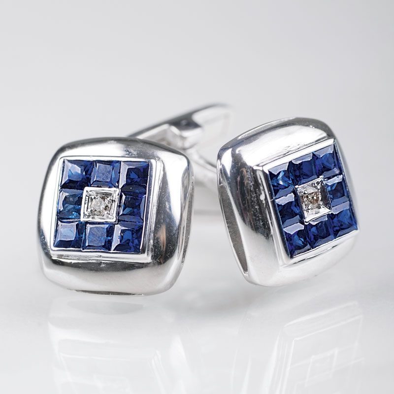 A pair of sapphire diamond cufflinks