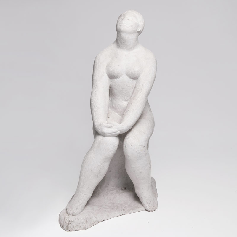 A sculpture 'Seated female nude'