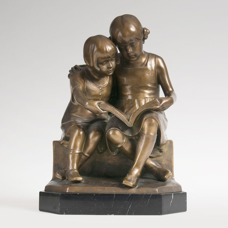 A Bronze Sculpture 'Two reading girls'
