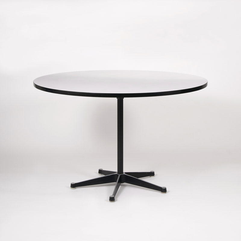 A round Vintage Eames Table