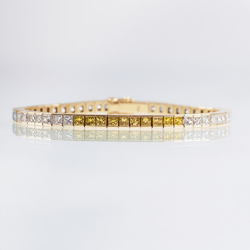 A highcarat bracelet with coloured diamonds