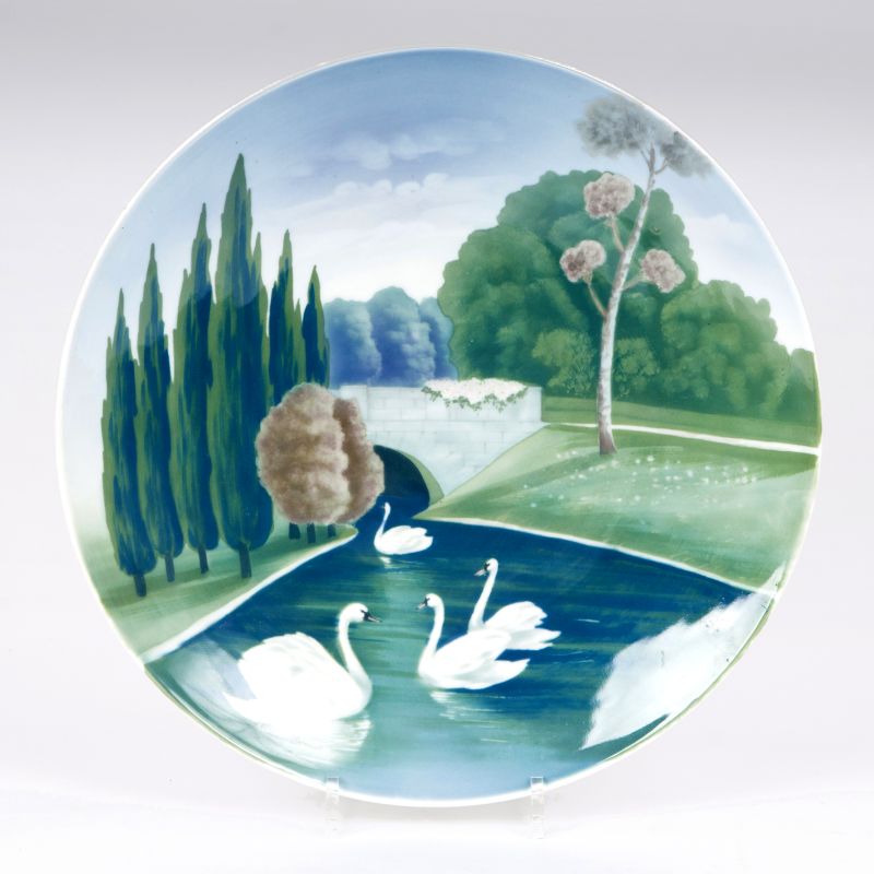 An Art Nouveau porcelain plate with swans