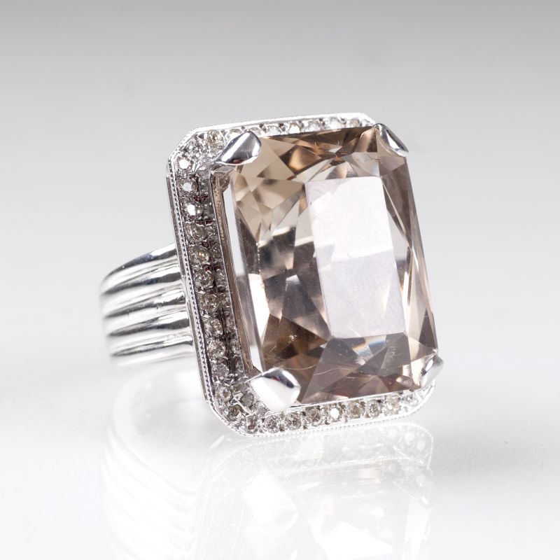 A smoky quartz diamond ring