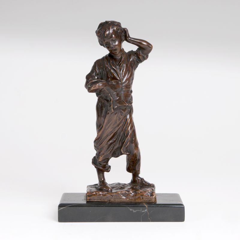 A Bronze Sculpture 'Shoemaker's boy'