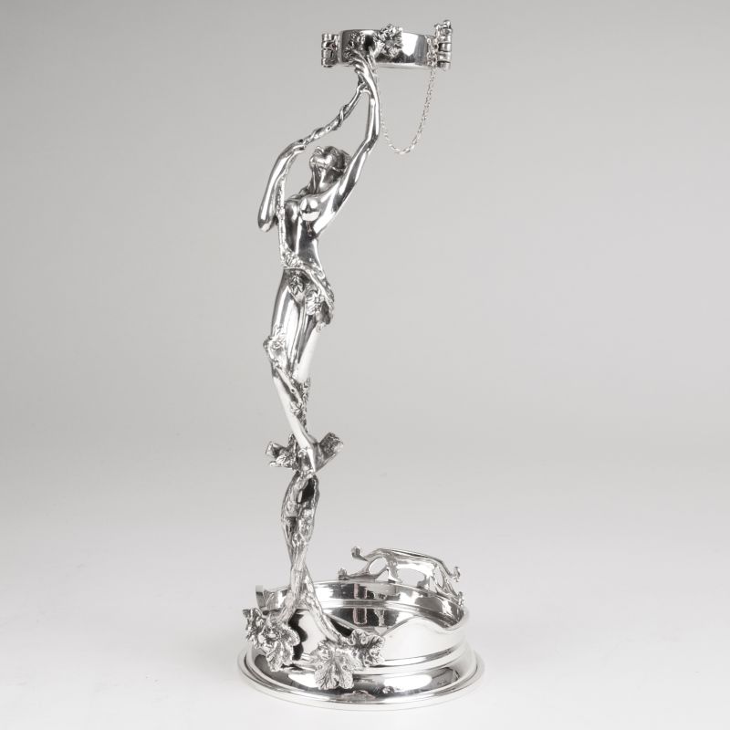 An extraordinary wine pourer with a female nude