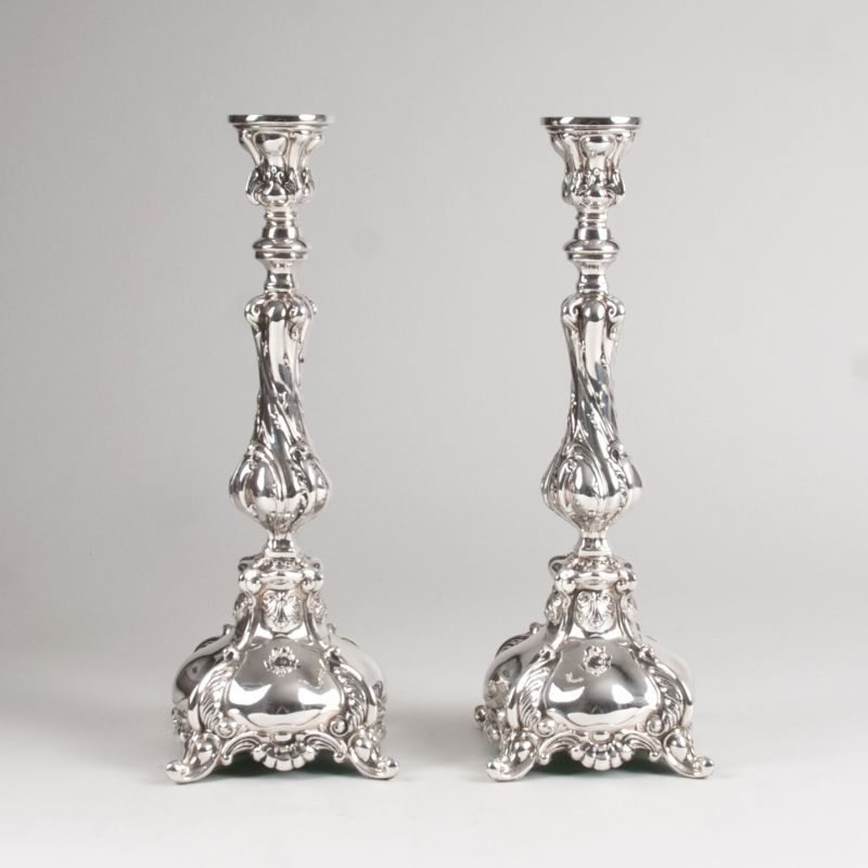 A pair of candlesticks in a rococo style